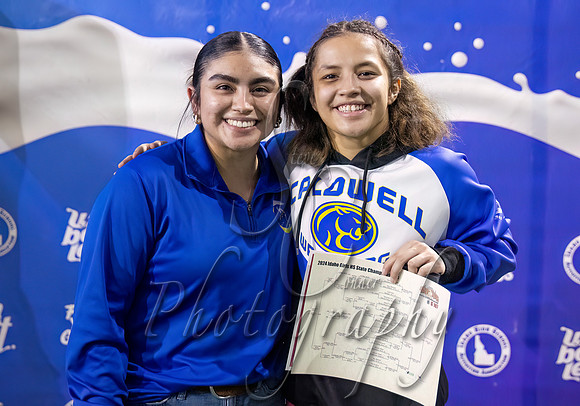 Girls 107lb Champion - Nia Avelino & Coach - Caldwell